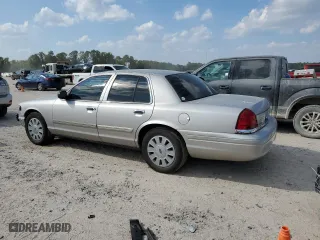 2010 Ford Police Interceptor with VIN 2FABP7BV5AX123274, listed as a Copart auction lot 71176934 with 118,874 mi miles and Salvage Title. Bid and sale history available at carsss.com. Image 2.