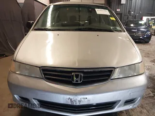 2002 Honda Odyssey LX z VIN 2HKRL18532H573727, wystawiony jako IAAI lot #42266783 z przebiegiem 127 491 mil mil oraz . Historia ofert i sprzedaży dostępna na DreamBid. Obrazek 13.