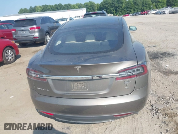 2016 Tesla Model S 70 with VIN 5YJSA1E1XGF126620, listed as a IAAI auction lot 40227035 with 71,400 mi miles and . Bid and sale history available at DreamBid. Image 16.