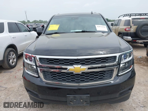 2015 Chevrolet Suburban LT with VIN 1GNSCJKC1FR304656, listed as a IAAI auction lot 42071124 with 133,140 mi miles. Bid and sale history available at carsss.com. Image 12.