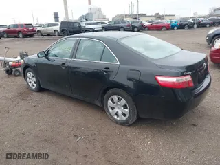 2007 Toyota Camry CE with VIN 4T1BE46K57U707992, listed as a IAAI auction lot 41927764 with 317,088 mi miles. Bid and sale history available at carsss.com. Image 3.