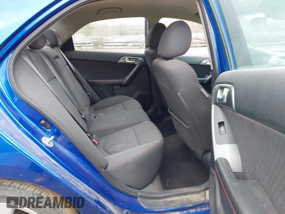 2010 Kia Forte SX with VIN KNAFW4A3XA5250341, listed as a IAAI auction lot 41698461 with 124,334 mi miles. Bid and sale history available at carsss.com. Image 8.