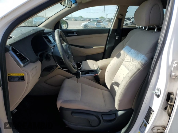 2017 Hyundai Tucson SE z VIN KM8J23A44HU511583, wystawiony jako Copart lot #57152345 z przebiegiem 85 679 mil mil oraz Szkoda całkowita • Salvage title. Historia ofert i sprzedaży dostępna na DreamBid. Obrazek 7.