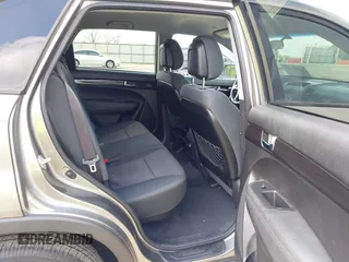 2013 Kia Sorento LX with VIN 5XYKTDA28DG336051, listed as a IAAI auction lot 41956476 with 179,549 mi miles. Bid and sale history available at carsss.com. Image 8.