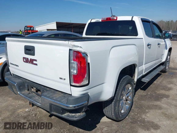2015 GMC Canyon 2WD SLT with VIN 1GTG5CE36F1151433, listed as a IAAI auction lot 41636107 with 117,682 mi miles. Bid and sale history available at carsss.com. Image 4.