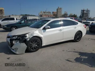 2014 Toyota Avalon Limited z VIN 4T1BK1EB0EU118645, wystawiony jako Copart lot #58979105 z przebiegiem 168 011 mil mil oraz Szkoda całkowita • Salvage title. Historia ofert i sprzedaży dostępna na DreamBid. Obrazek 1.