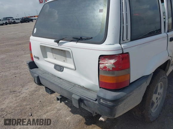 1994 Jeep Grand Cherokee Laredo with VIN 1J4FX58SXRC120936, listed as a IAAI auction lot 42530212 with 126,367 mi miles and . Bid and sale history available at DreamBid. Image 12.