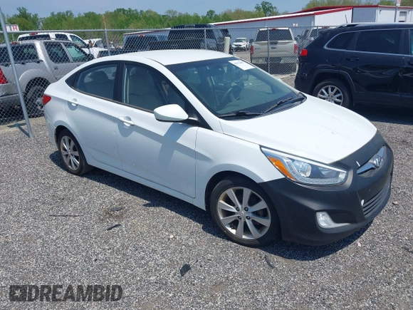 2014 Hyundai Accent GLS with VIN KMHCU4AE8EU589409, listed as a IAAI auction lot 42171087 with 209,204 mi miles. Bid and sale history available at carsss.com. Image 1.