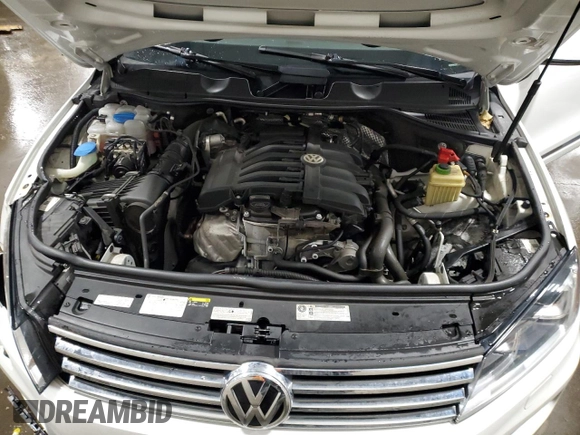 2017 Volkswagen Touareg Wolfsburg Edition z VIN WVGRF7BP7HD002143, wystawiony jako Copart lot #45328325 z przebiegiem 107 476 mil mil oraz Szkoda całkowita • Salvage title. Historia ofert i sprzedaży dostępna na DreamBid. Obrazek 13.