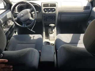 2002 Nissan Frontier XE с VIN 1N6ED29X12C379157, выставлен на аукционе Copart как лот 57347215 с пробегом 206 559 миль миль и Чистый • Clean title. История ставок и продаж доступна на DreamBid. Изображение 8.