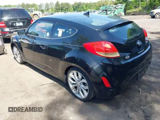2013 Hyundai Veloster w/Black Int with VIN KMHTC6AD2DU120059, listed as a IAAI auction lot 42355902 with 81,221 mi miles and . Bid and sale history available at DreamBid. Image 3.