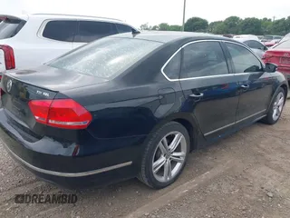 2014 Volkswagen Passat TDI SEL Premium with VIN 1VWCN7A33EC068280, listed as a IAAI auction lot 42086420 with 153,656 mi miles. Bid and sale history available at carsss.com. Image 4.