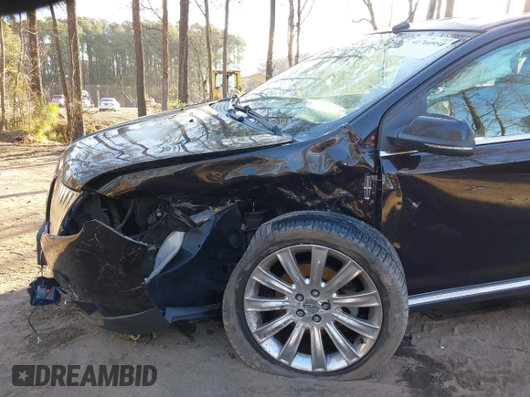2013 Lincoln MKX with VIN 2LMDJ6JK8DBL60753, listed as a IAAI auction lot 41760954 with 121,714 mi miles. Bid and sale history available at carsss.com. Image 6.