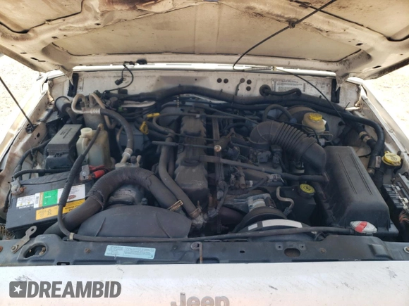 2001 Jeep Grand Cherokee with VIN 1J4FT47S21L596528, listed as a Copart auction lot 68641764 with Not provided miles and Salvage title. Bid and sale history available at DreamBid. Image 12.