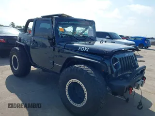 2007 Jeep Wrangler Rubicon z VIN 1J4GA64117L209610, wystawiony jako IAAI lot #42477610 z przebiegiem 207 759 mil mil oraz . Historia ofert i sprzedaży dostępna na DreamBid. Obrazek 1.
