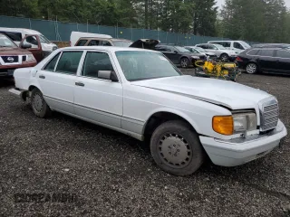 1990 Mercedes-Benz 300 with VIN WDBCA25D9LA550909, listed as a Copart auction lot 82717124 with 221,701 mi miles and Salvage Title. Bid and sale history available at DreamBid. Image 4.