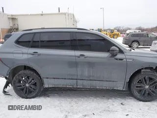 2022 Volkswagen Tiguan SE R-Line Black z VIN 3VVCB7AX9NM024296, wystawiony jako IAAI lot #41592795 z przebiegiem 45 308 mil mil oraz . Historia ofert i sprzedaży dostępna na DreamBid. Obrazek 14.