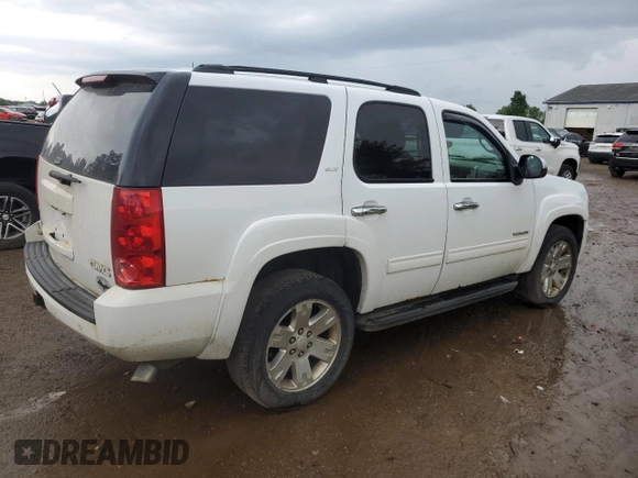 2011 GMC Yukon SLT z VIN 1GKS2CE00BR150352, wystawiony jako Copart lot #61031085 z przebiegiem 258 142 mil mil oraz Czysty tytuł • Clean title. Historia ofert i sprzedaży dostępna na DreamBid. Obrazek 3.