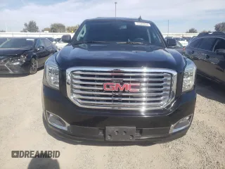 2020 GMC Yukon XL SLT with VIN 1GKS1GKC9LR186504, listed as a Copart auction lot 77565634 with 20,074 mi miles and Salvage Title. Bid and sale history available at carsss.com. Image 5.