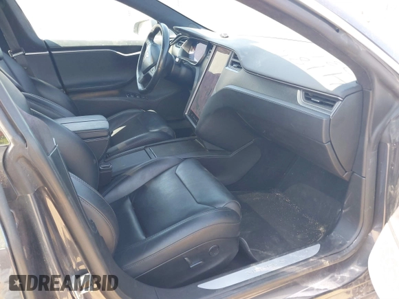 2018 Tesla Model S 75D with VIN 5YJSA1E21JF287115, listed as a IAAI auction lot 41850318 with Not provided miles and . Bid and sale history available at DreamBid. Image 5.