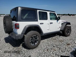 2025 Jeep Wrangler Rubicon with VIN 1C4PJXFN2SW525858, listed as a Copart auction lot 57415905 with 7,802 mi miles and Salvage title. Bid and sale history available at DreamBid. Image 3.