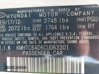 2012 Hyundai Veloster w/Gray Int z VIN KMHTC6AD6CU063301, wystawiony jako IAAI lot #42142593 z przebiegiem 100 796 mil mil oraz . Historia ofert i sprzedaży dostępna na DreamBid. Obrazek 9.