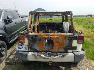 2008 Jeep Wrangler Unlimited X с VIN 1J4GA39128L608115, выставлен на аукционе Copart как лот 58653595 с пробегом Не указан миль и На запчасти • Non repairable. История ставок и продаж доступна на DreamBid. Изображение 6.