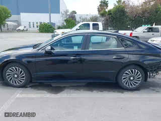 2023 Hyundai Sonata Hybrid Limited with VIN KMHL54JJ0PA061460, listed as a IAAI auction lot 42081519 with 54,624 mi miles. Bid and sale history available at carsss.com. Image 15.