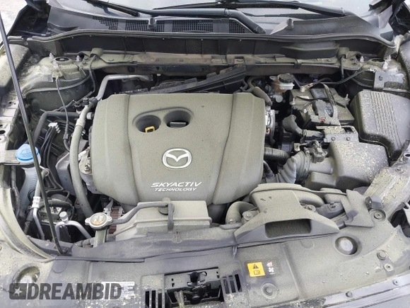 2018 Mazda CX-5 Grand Touring with VIN JM3KFBDM1J0358197, listed as a IAAI auction lot 41967940 with 148,119 mi miles and . Bid and sale history available at DreamBid. Image 10.