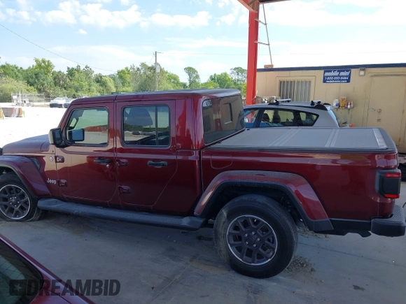 2021 Jeep Gladiator Overland z VIN 1C6HJTFGXML553983, wystawiony jako IAAI lot #41903068 z przebiegiem 54 386 mil mil oraz . Historia ofert i sprzedaży dostępna na DreamBid. Obrazek 14.