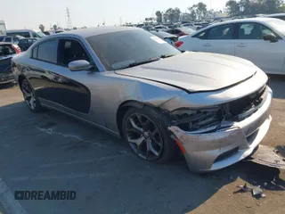 2015 Dodge Charger SXT z VIN 2C3CDXHG1FH866973, wystawiony jako IAAI lot #41275285 z przebiegiem 91 517 mil mil oraz . Historia ofert i sprzedaży dostępna na DreamBid. Obrazek 1.