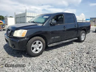 2006 Nissan Titan XE with VIN 1N6BA07A96N520274, listed as a Copart auction lot 59012855 with 205,144 mi miles and Salvage title. Bid and sale history available at DreamBid. Image 1.