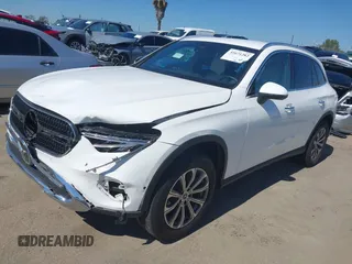 2023 Mercedes-Benz GLC with VIN W1NKM4GB2PU018233, listed as a IAAI auction lot 41671282 with 1 mi miles. Bid and sale history available at carsss.com. Image 2.