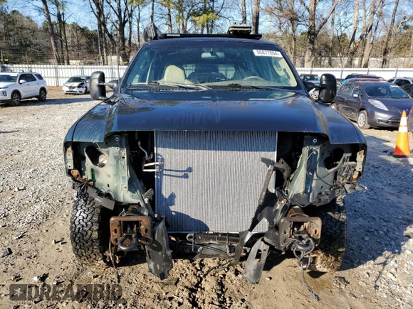 2003 Ford Excursion Limited z VIN 1FMSU43P13EC70760, wystawiony jako Copart lot #86877894 z przebiegiem 311 258 mil mil oraz Szkoda całkowita • Salvage title. Historia ofert i sprzedaży dostępna na DreamBid. Obrazek 5.