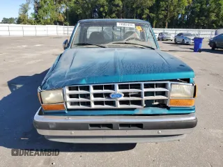 1992 Ford Ranger with VIN 1FTCR10A3NTA81065, listed as a Copart auction lot 74002434 with 9,827 mi miles and Salvage Title. Bid and sale history available at carsss.com. Image 5.