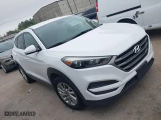 2016 Hyundai Tucson SE with VIN KM8J23A4XGU238521, listed as a IAAI auction lot 41886259 with 126,974 mi miles. Bid and sale history available at carsss.com. Image 1.