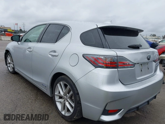 2014 Lexus CT 200h Hybrid with VIN JTHKD5BH0E2173721, listed as a IAAI auction lot 41798469 with 124,337 mi miles. Bid and sale history available at carsss.com. Image 3.