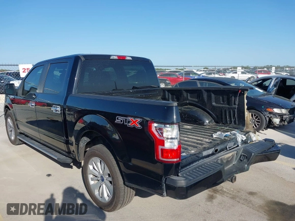 2018 Ford F-150 XL with VIN 1FTEW1C58JKC02382, listed as a IAAI auction lot 42010568 with 124,757 mi miles and . Bid and sale history available at DreamBid. Image 3.