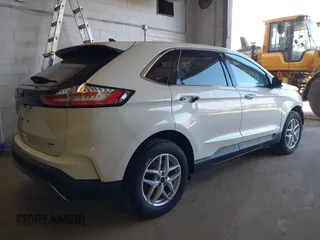 2021 Ford Edge SEL with VIN 2FMPK4J9XMBA38672, listed as a IAAI auction lot 41992994 with 31,834 mi miles. Bid and sale history available at carsss.com. Image 4.