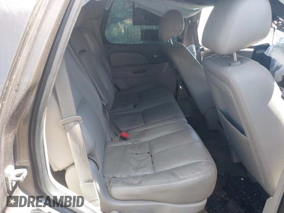 2012 Chevrolet Tahoe LT with VIN 1GNSKBE09CR100385, listed as a IAAI auction lot 41743325 with 185,174 mi miles and . Bid and sale history available at DreamBid. Image 8.