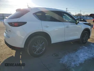2021 Mazda CX-5 Touring with VIN JM3KFBCM9M0336910, listed as a Copart auction lot 48032275 with 65,515 mi miles and Salvage Title. Bid and sale history available at carsss.com. Image 3.