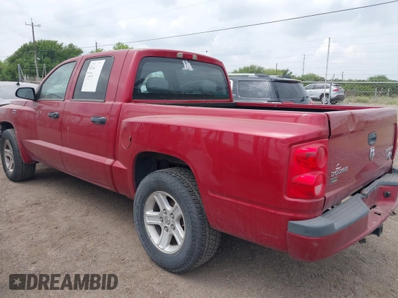 2010 Dodge Dakota with VIN 1D7CE3GP0AS166078, listed as a IAAI auction lot 41856634 with 235,615 mi miles and . Bid and sale history available at DreamBid. Image 3.