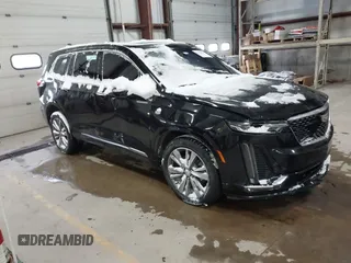 2022 Cadillac XT6 Premium Luxury with VIN 1GYKPDRS7NZ112856, listed as a IAAI auction lot 41328577 with 1 mi miles. Bid and sale history available at carsss.com. Image 1.