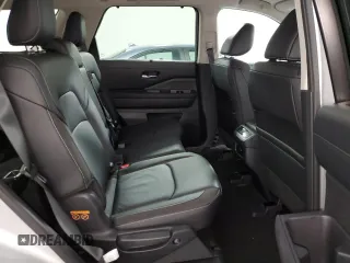 2025 Nissan Pathfinder SL z VIN 5N1DR3CC2SC228707, wystawiony jako Copart lot #58563525 z przebiegiem 5915 mil mil oraz Tytuł czysty. Historia ofert i sprzedaży dostępna na DreamBid. Obrazek 11.