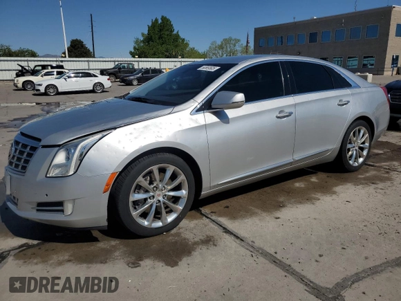 2013 Cadillac XTS Luxury with VIN 2G61R5S32D9131914, listed as a Copart auction lot 56569505 with 123,427 mi miles and Salvage title. Bid and sale history available at DreamBid. Image 1.