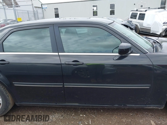 2005 Chrysler 300 Touring with VIN 2C3AA53G85H155393, listed as a IAAI auction lot 42171752 with 225,385 mi miles and . Bid and sale history available at DreamBid. Image 14.