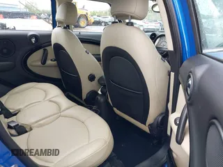 2014 MINI Countryman S z VIN WMWZC5C52EWP38659, wystawiony jako IAAI lot #42229976 z przebiegiem 115 229 mil mil oraz . Historia ofert i sprzedaży dostępna na DreamBid. Obrazek 8.
