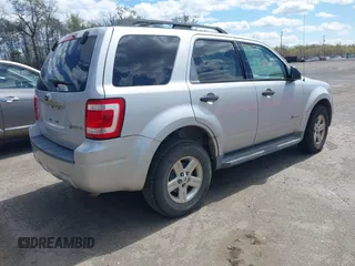 2009 Ford Escape Hybrid with VIN 1FMCU593X9KA36061, listed as a IAAI auction lot 42060150 with 183,184 mi miles. Bid and sale history available at carsss.com. Image 4.