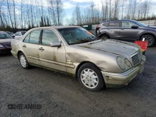 1999 Mercedes-Benz E with VIN WDBJF25H2XA840202, listed as a Copart auction lot 49916415 with Not Provided miles and Clean Title. Bid and sale history available at DreamBid. Image 4.