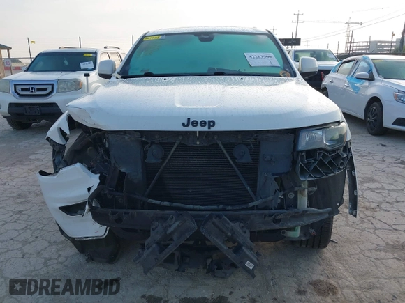 2017 Jeep Grand Cherokee Laredo with VIN 1C4RJEAG1HC720656, listed as a IAAI auction lot 42263500 with 184,239 mi miles and . Bid and sale history available at DreamBid. Image 13.